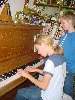 DSC00108.JPG (600x800) 95.15KB Lynne and Karen at the piano