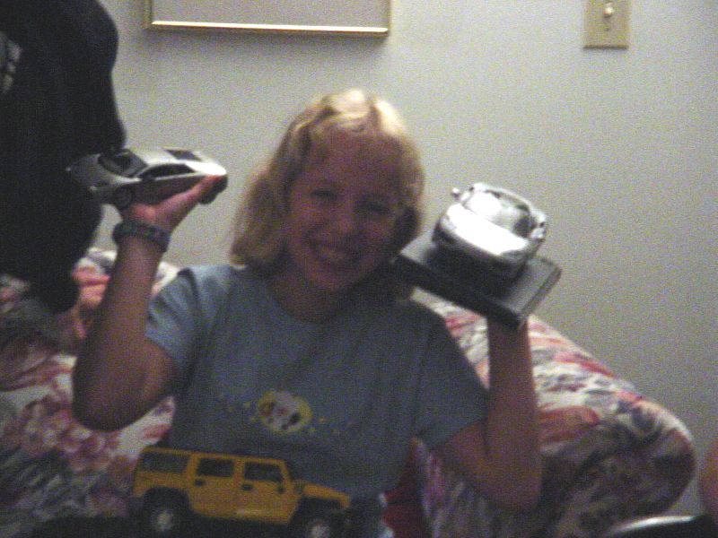 06_BriannaTauntingJeremy-.JPG (800x600) 79.14KB Brianna taunting Jeremy - holding his toys hostage.         